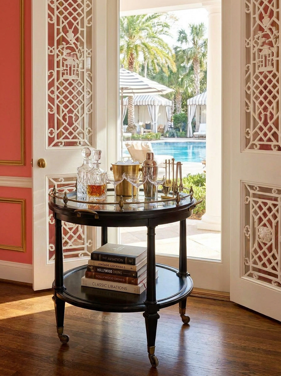 https://chairish-prod.freetls.fastly.net/image/product/master/5b852508-3182-4124-9188-70da2fb9f3c7/large-hickory-chair-atelier-collection-oval-bar-cart-with-brass-gallery-rail-and-antiqued-mirror-top-1705