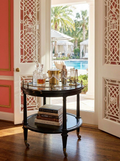 https://chairish-prod.freetls.fastly.net/image/product/master/5b852508-3182-4124-9188-70da2fb9f3c7/large-hickory-chair-atelier-collection-oval-bar-cart-with-brass-gallery-rail-and-antiqued-mirror-top-1705