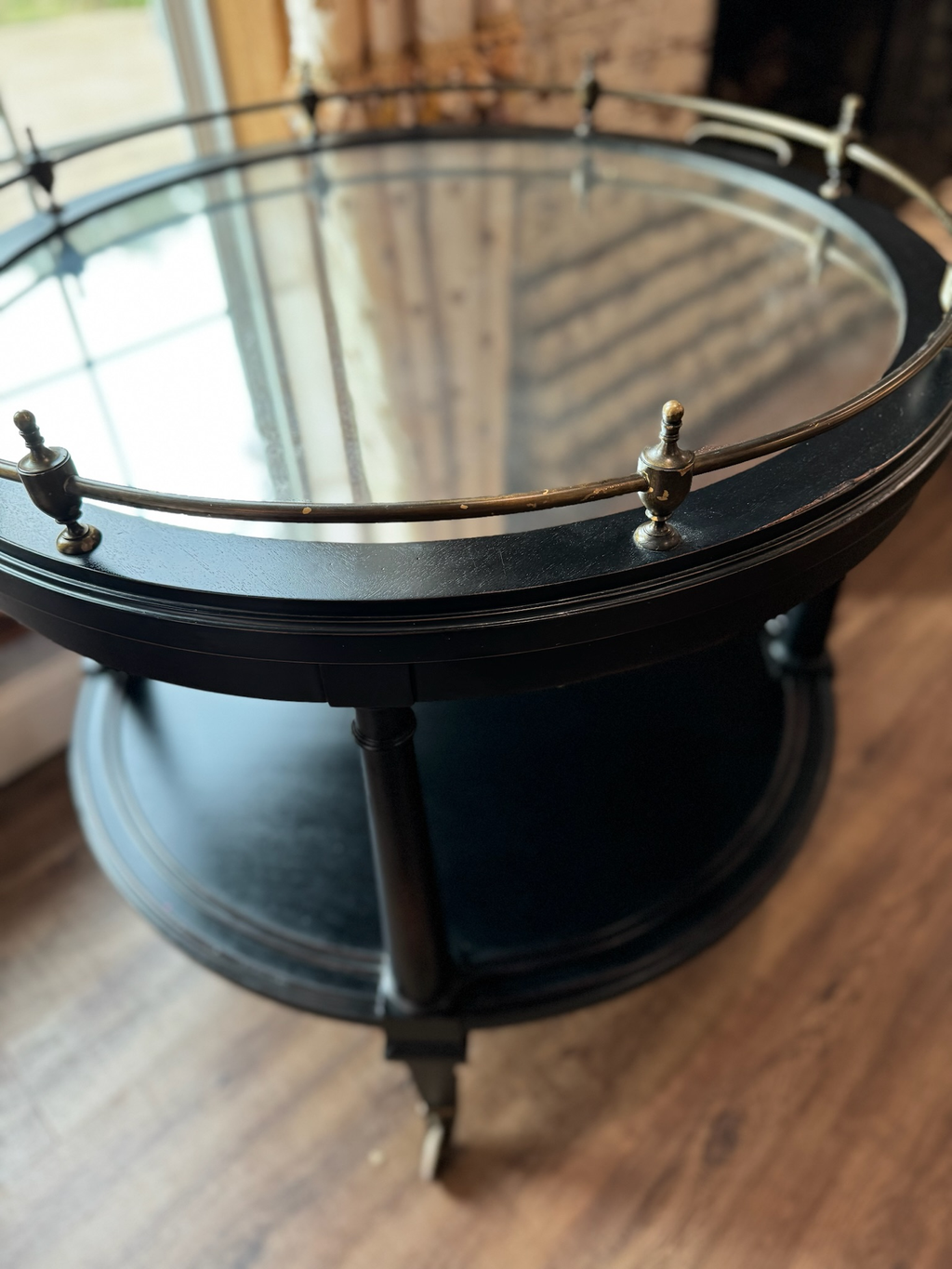 https://chairish-prod.freetls.fastly.net/image/product/master/34812982-1294-41ec-b096-00df8c753b65/large-hickory-chair-atelier-collection-oval-bar-cart-with-brass-gallery-rail-and-antiqued-mirror-top-2227