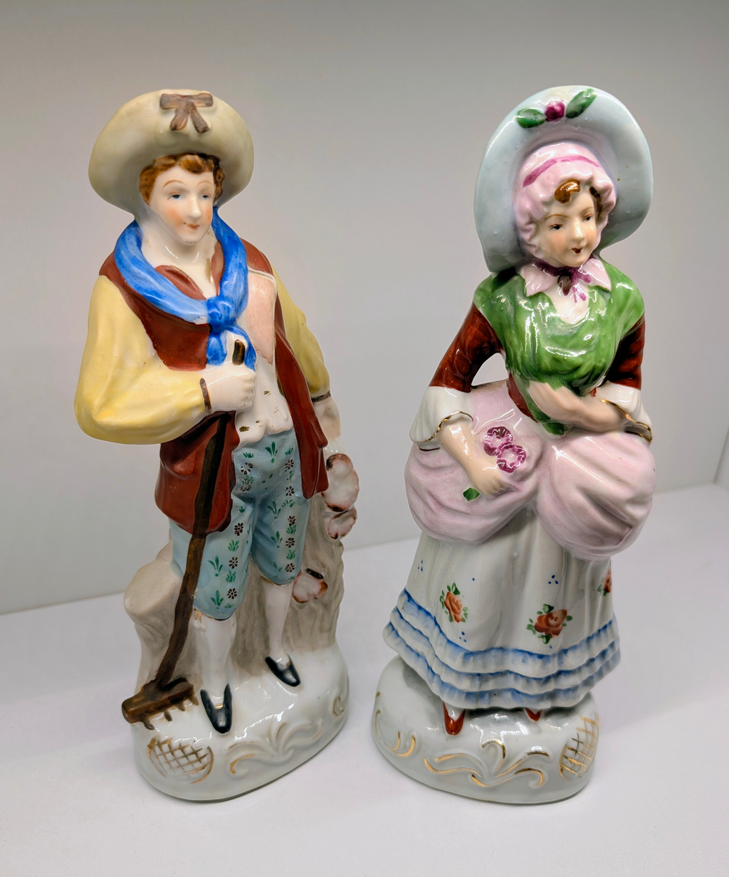 https://chairish-prod.freetls.fastly.net/image/product/master/07968432-02a2-452b-b6b9-e25fe34a86c2/pair-of-made-in-occupied-japan-porcelain-staffordshire-style-figurines-circa-19451952-3163