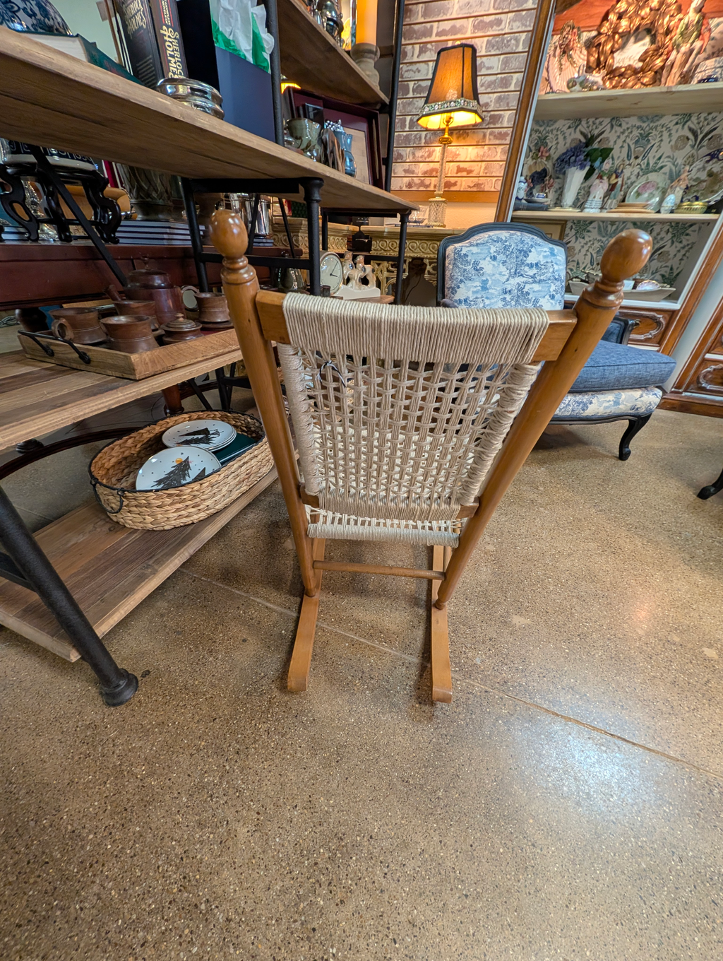 https://chairish-prod.freetls.fastly.net/image/product/master/eb315c09-b421-46b1-bdd9-5114c37c1412/restored-vintage-childs-rocking-chair-with-hand-woven-macrame-seat-1062