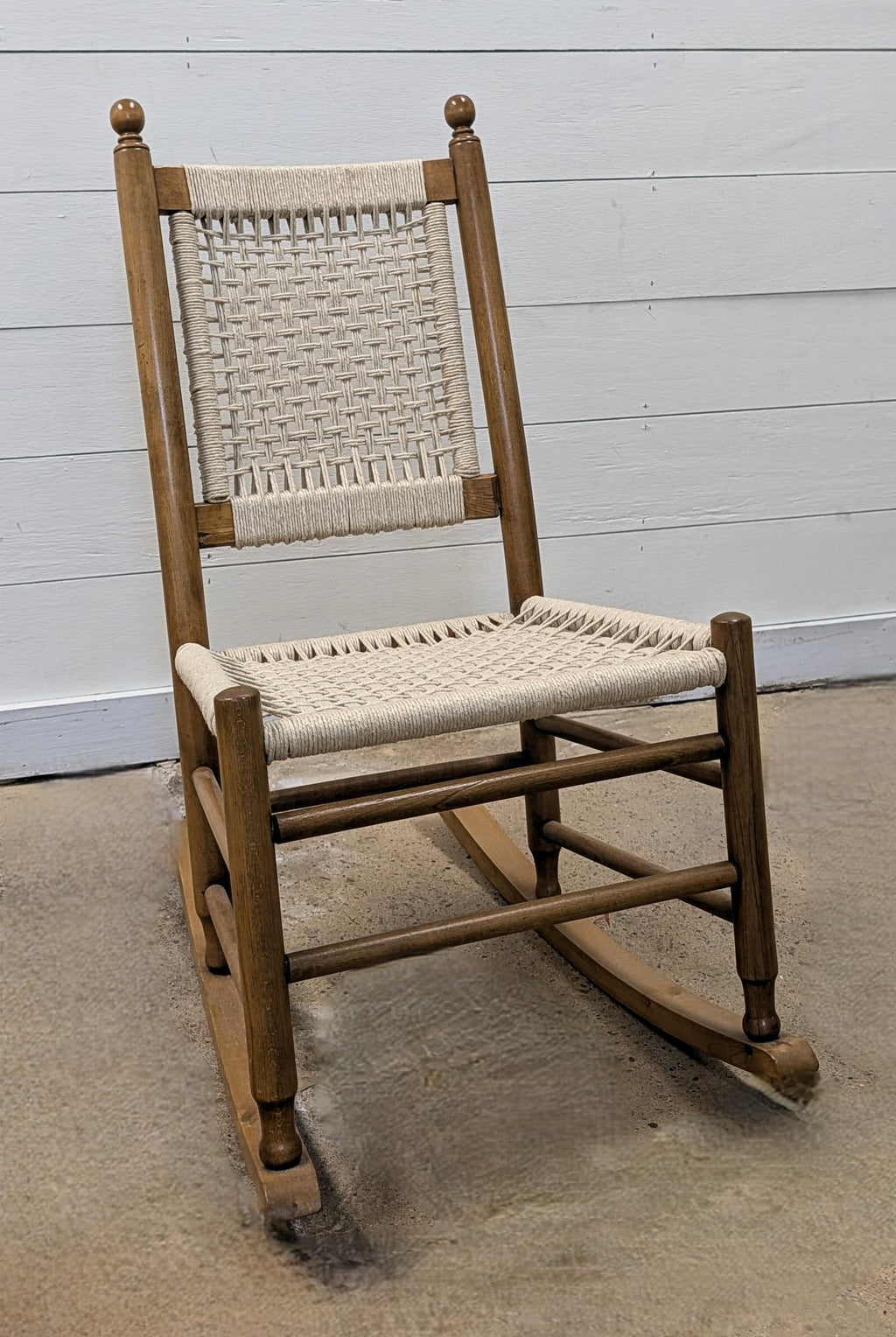 https://chairish-prod.freetls.fastly.net/image/product/master/381b6ac9-85fb-4c24-9bb6-2032d13acbb3/restored-vintage-childs-rocking-chair-with-hand-woven-macrame-seat-4166