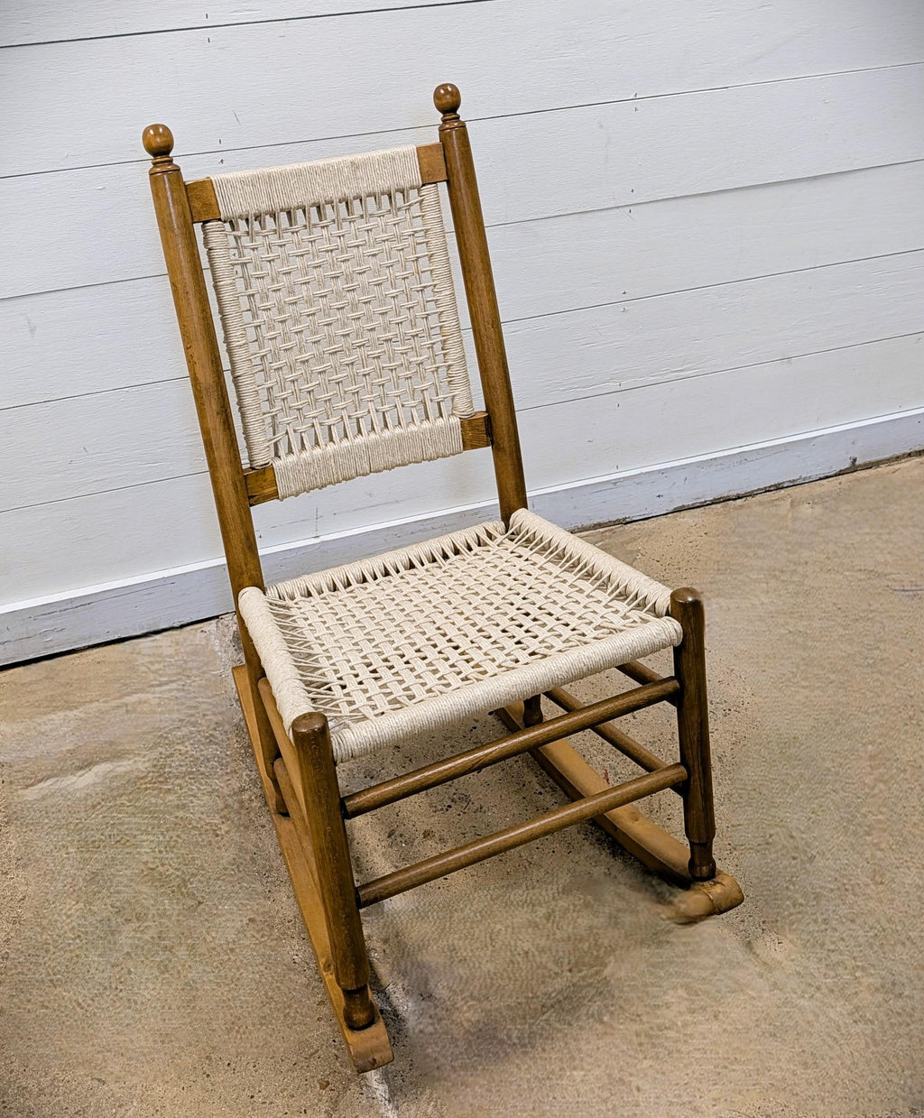 https://chairish-prod.freetls.fastly.net/image/product/master/0b44c1c9-1c8f-4f14-987e-07eb7b7270d3/restored-vintage-childs-rocking-chair-with-hand-woven-macrame-seat-7407