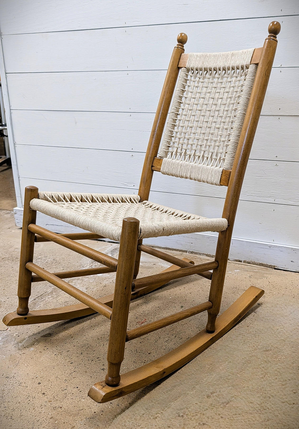 https://chairish-prod.freetls.fastly.net/image/product/master/d72eb745-f496-475c-a2fe-17b5bbf813aa/restored-vintage-childs-rocking-chair-with-hand-woven-macrame-seat-8846