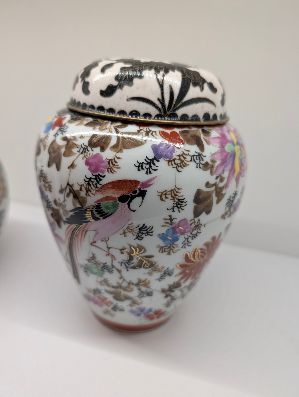https://chairish-prod.freetls.fastly.net/image/product/master/c4123d4f-386a-4d38-9db9-a8a9e1682190/vintage-chinese-porcelain-ginger-jar-with-lid-famille-rose-bird-and-floral-decor-2649