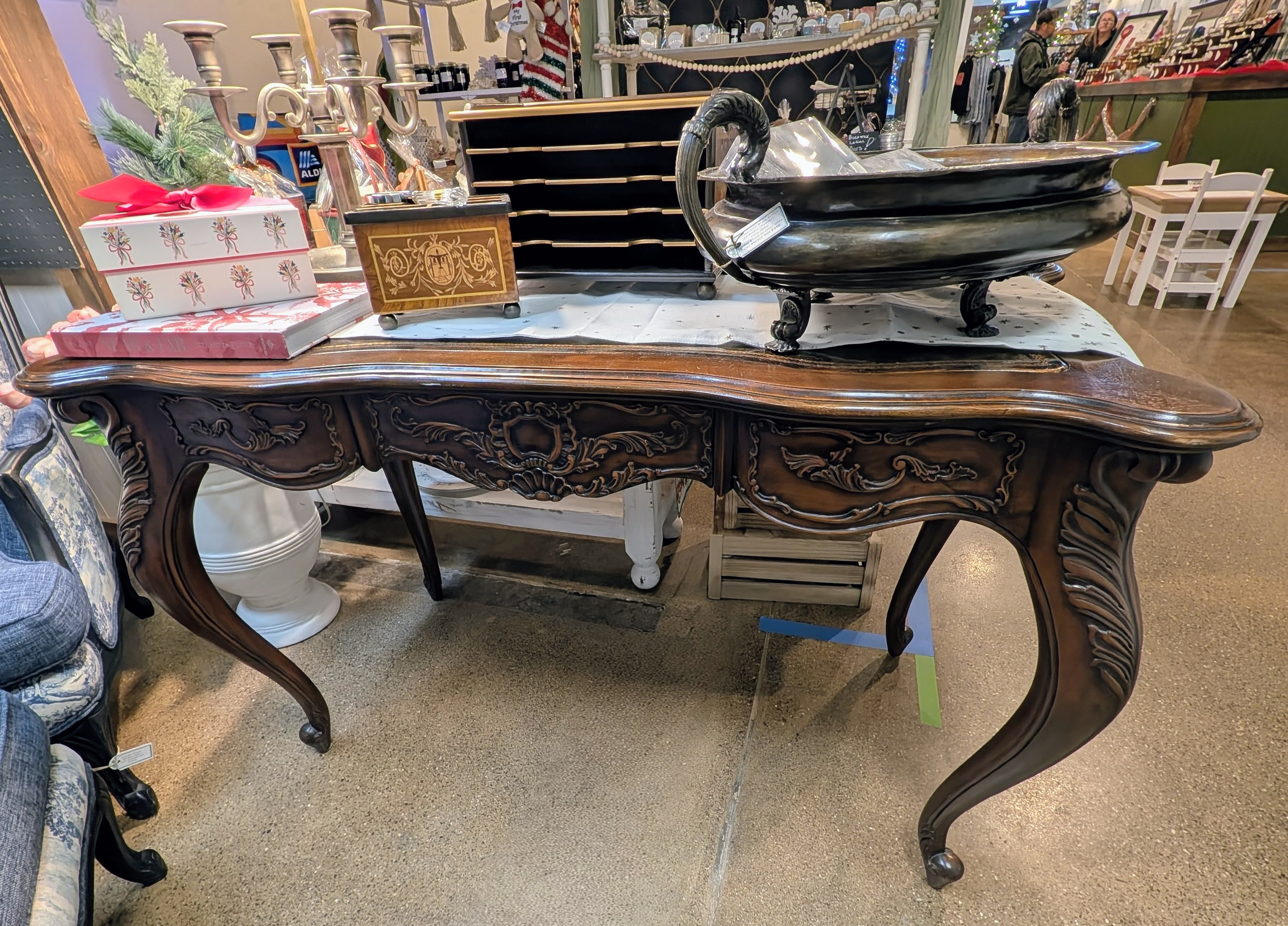 https://chairish-prod.freetls.fastly.net/image/product/master/b8a7a294-ecd1-4ba5-bd0c-4ee949298e04/vintage-french-louis-xv-style-carved-walnut-writing-desk-with-leather-top-2782